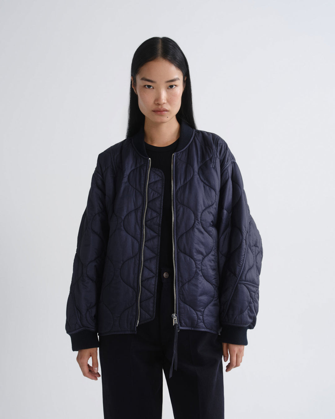 Agolde Isla Quilted Jacket in Ink on model