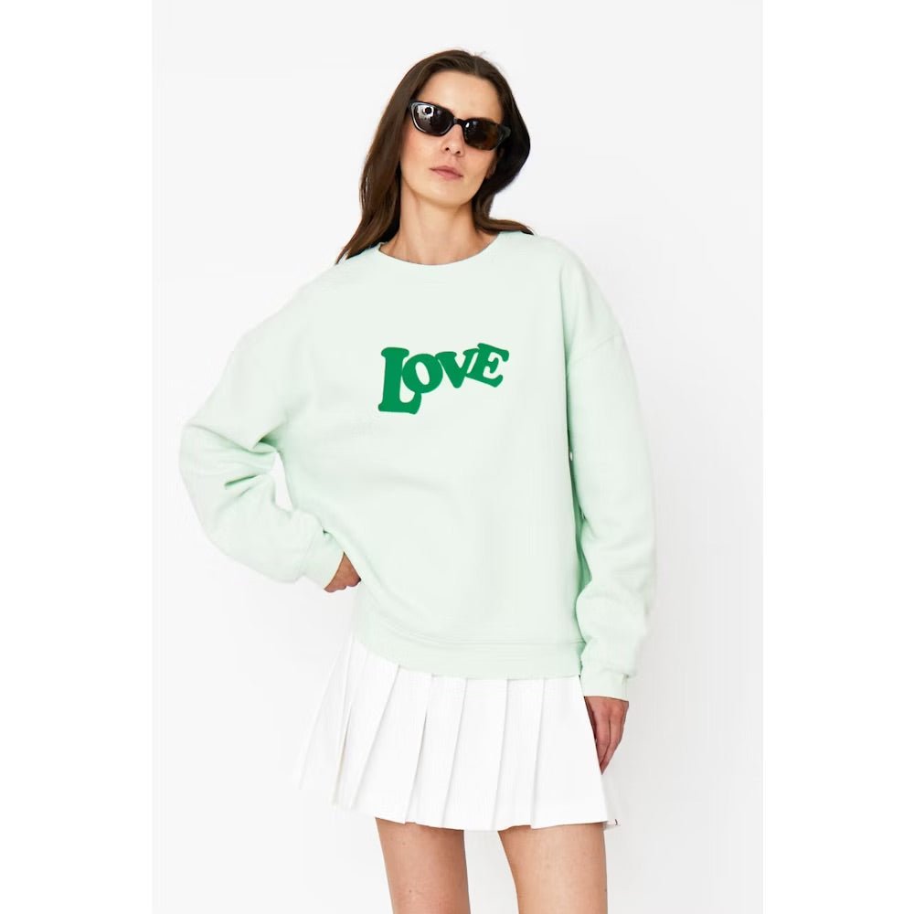 Kule Oversized 70 s LOVE Sweatshirt in Mint Kalifornia Jean Bar