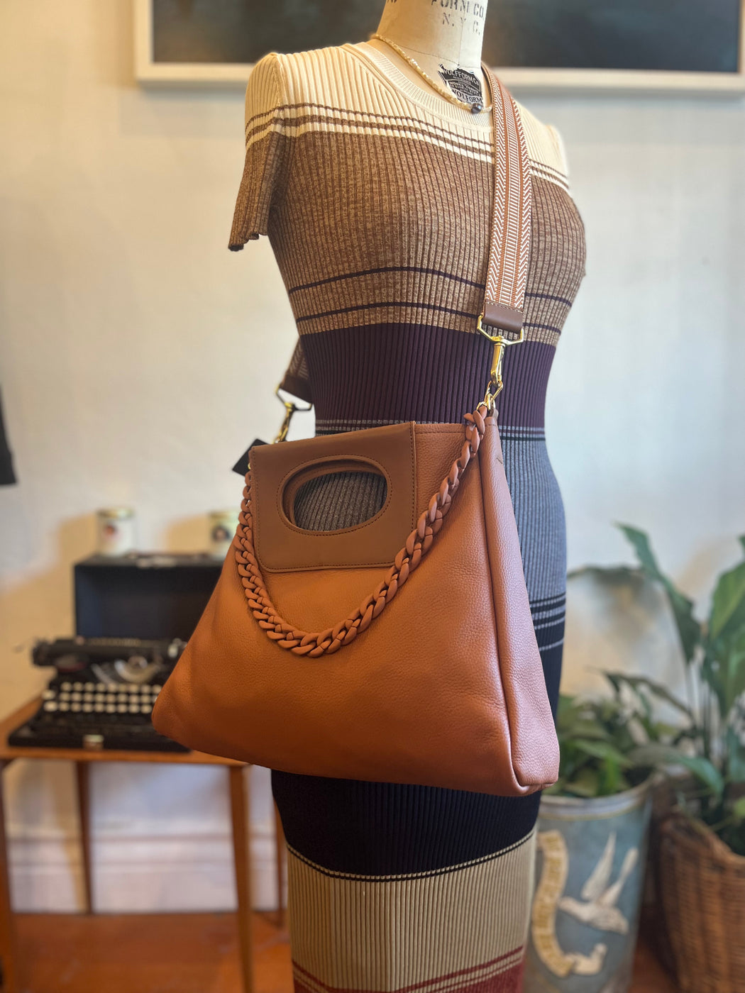 The Cass Clutch Stinson Amber Leather with Dream Weaver Strap